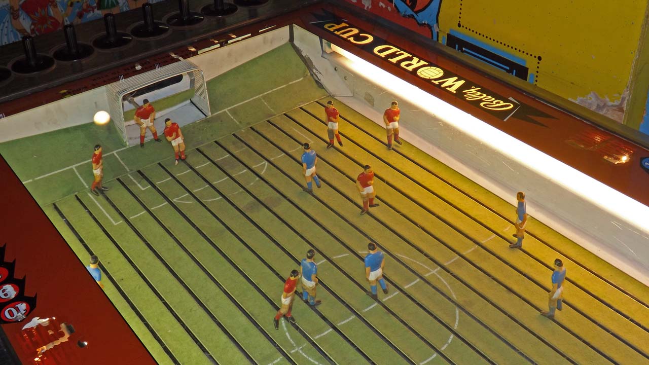 a soccer game, similar to foosball